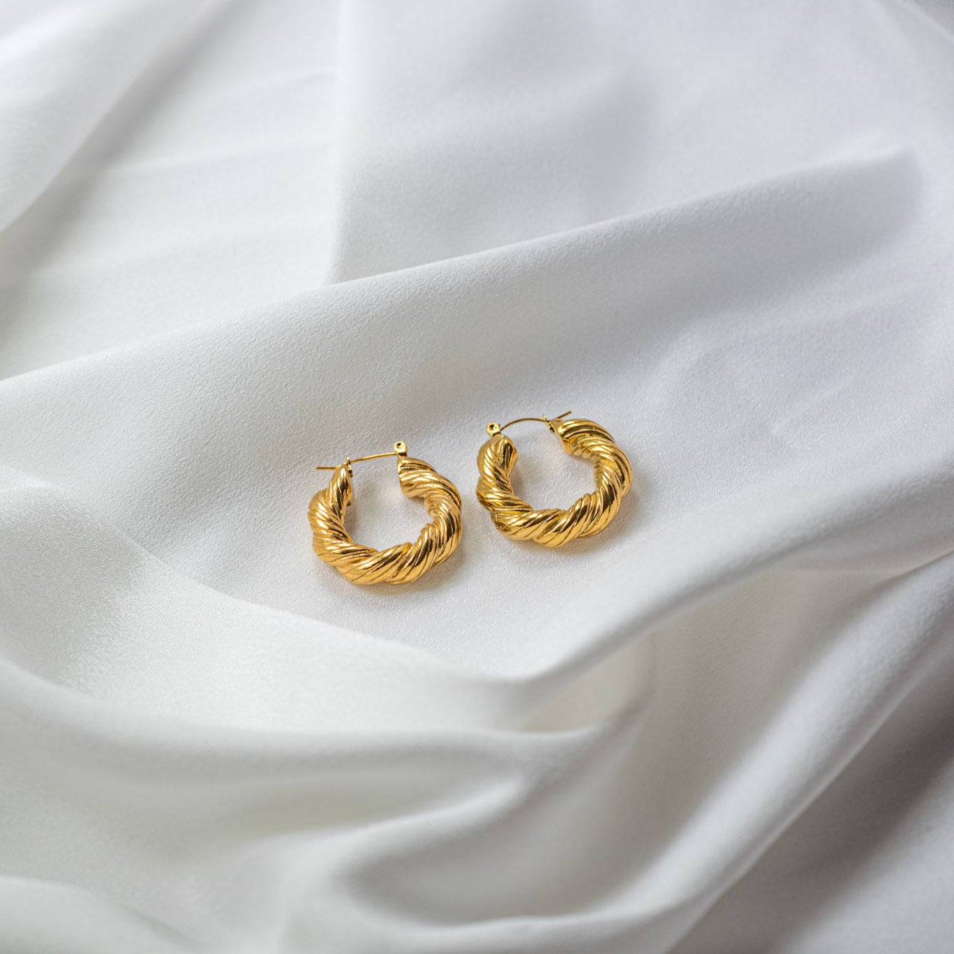 Virelle Hoops | Twisted Gold Hoop Earrings — detail view — TJAURI jewelry