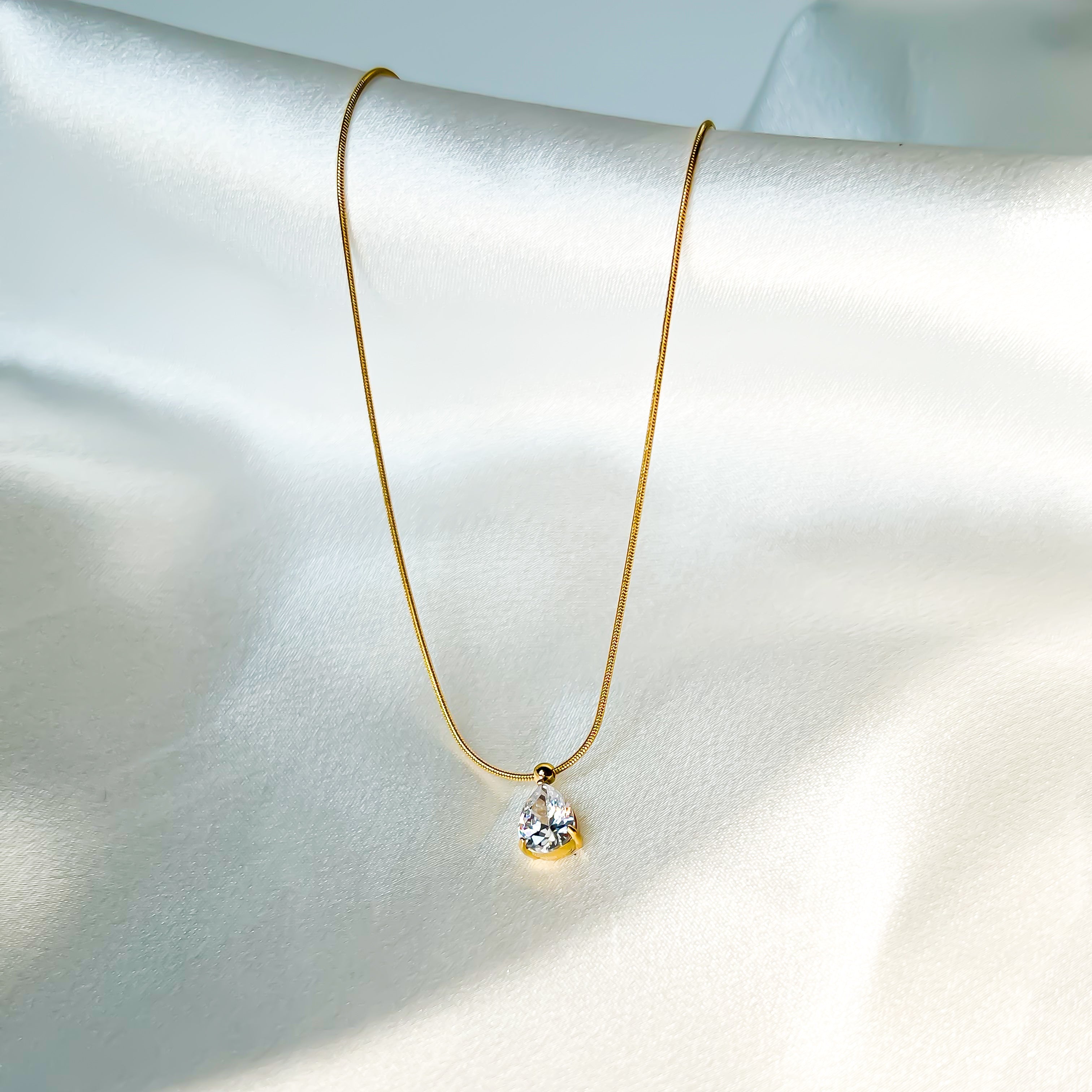 Teara Necklace | Waterproof Gold Teardrop Pendant — detail view — TJAURI jewelry